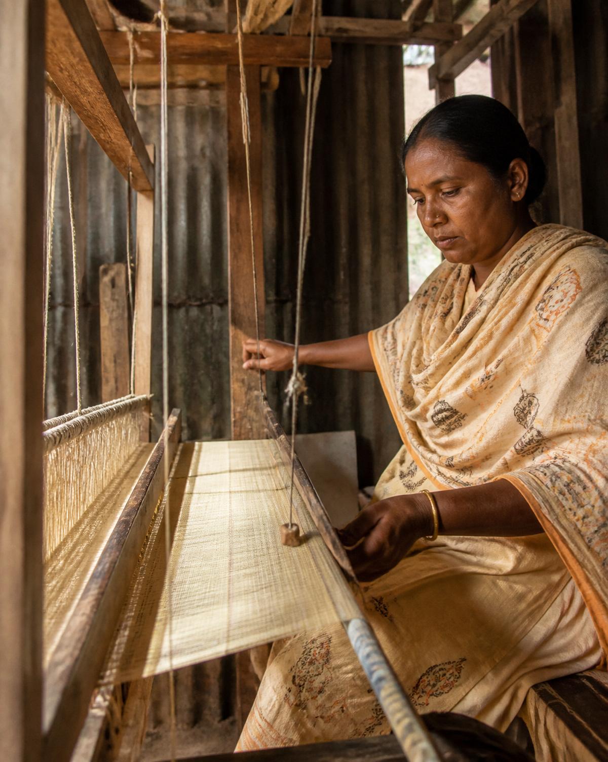 Traditional handloom weaving natural cotton in rural Bangladesh